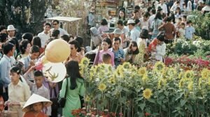 Choose a familiar cultural symbol, such as traditional Tet flower markets.